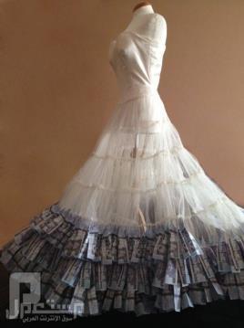 بالصور.. سعودية تصمم فستاناً من النقود مستخدمة مليون ريال من فئة الـ 500