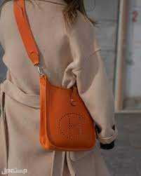 مواصفات شنط هيرمس وأسعارها حقيبة Evelyn bags باللون البرتقالي