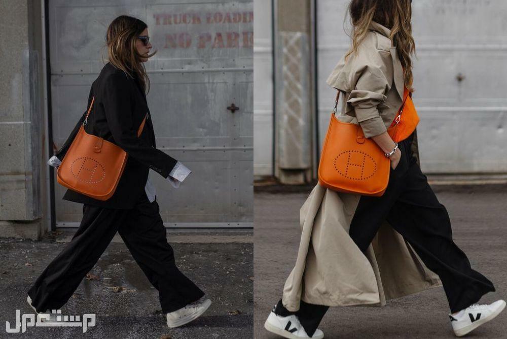 مواصفات شنط هيرمس وأسعارها شكل حقيبة Evelyn bags أثناء الارتداء