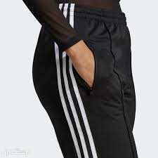 نصائح لاختيار القطع الأساسية للملابس الرياضية النسائية في الإمارات العربية المتحدة تفاصيل سروال ADIDAS Adidcolor Classics Firebird Primeblue Track Pants