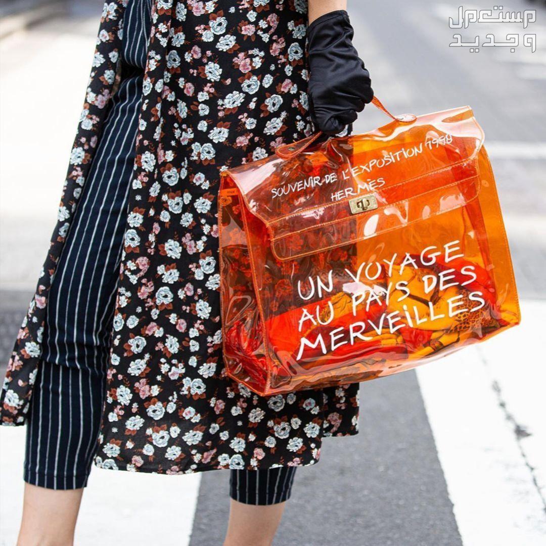 أفضل حقيبة شفافة لعام 2023 حقيبة شفافة من hermes 1997 pre-owned Kelly vinyl tote bag باللون البرتقالي