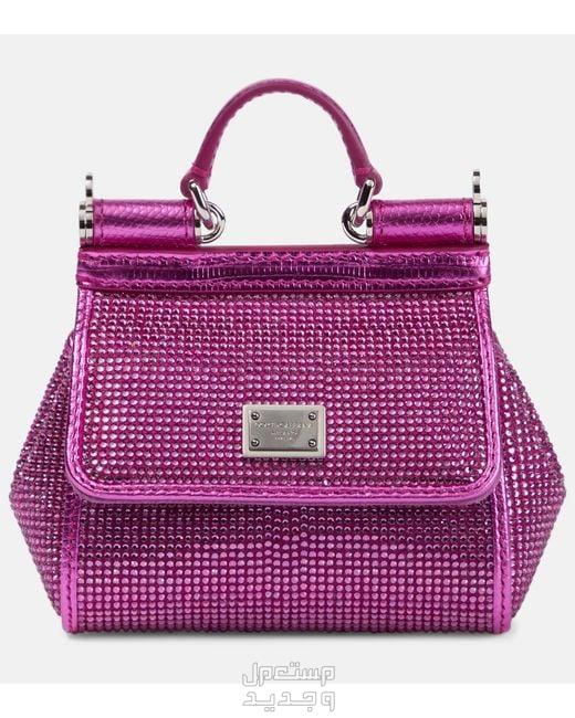 أفضل حقيبة لامعة من أشهر الماركات العالمية حقيبة dolce&gabbana sicily medium embellished shoulder bag باللون الفوشيا