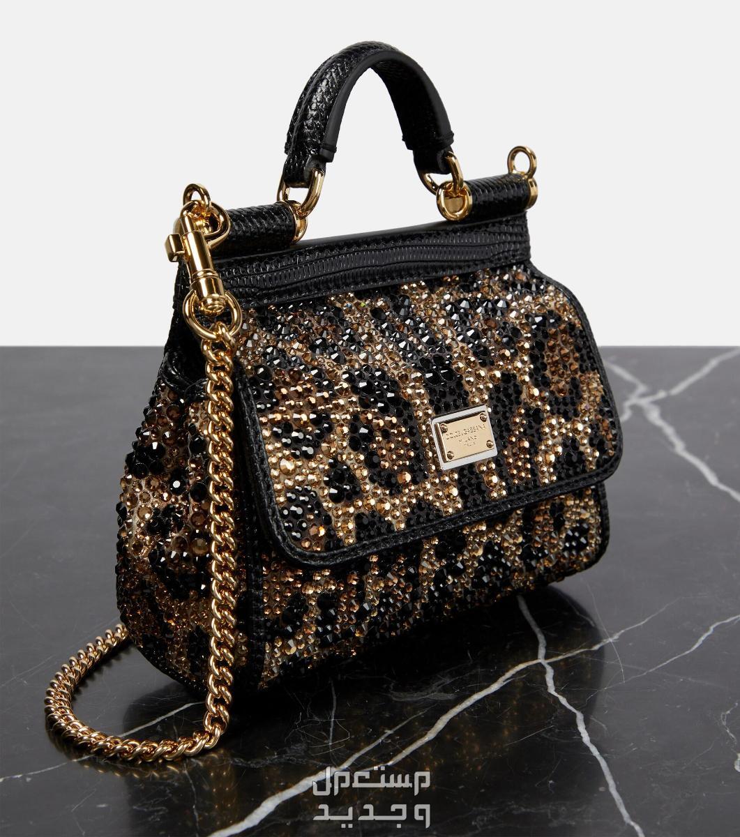 أفضل حقيبة لامعة من أشهر الماركات العالمية حقيبة لامعة من dolce&gabbana sicily medium embellished shoulder bag