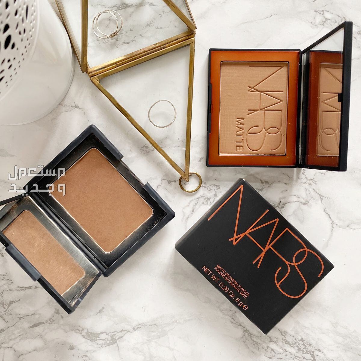 أجدد مستحضرات التجميل من البرونزر والهايلايتر لشتاء 2023-2024 برونزر من NARS Mini Laguna Bronzing Powder in Laguna 08