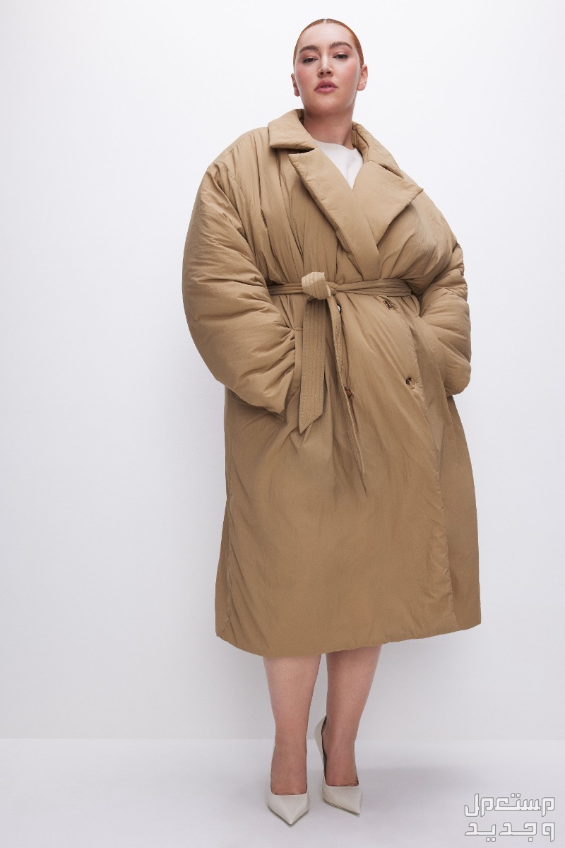 أفضل ترنش كوت بيج نسائي لشتاء 2024 ترنش كوت بيج من good American puffed nylon double breasted robe coat