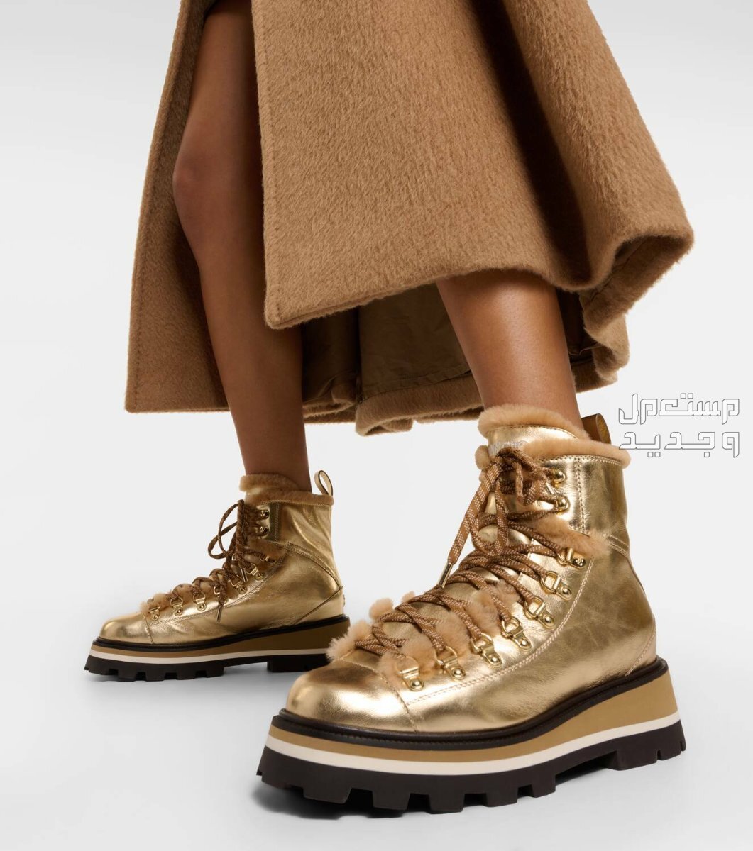 أحدث موديلات موضة أحذية بوت في شتاء 2024(صور) حذاء Jimmy choo chike shearling lined leather boots باللون الذهبي