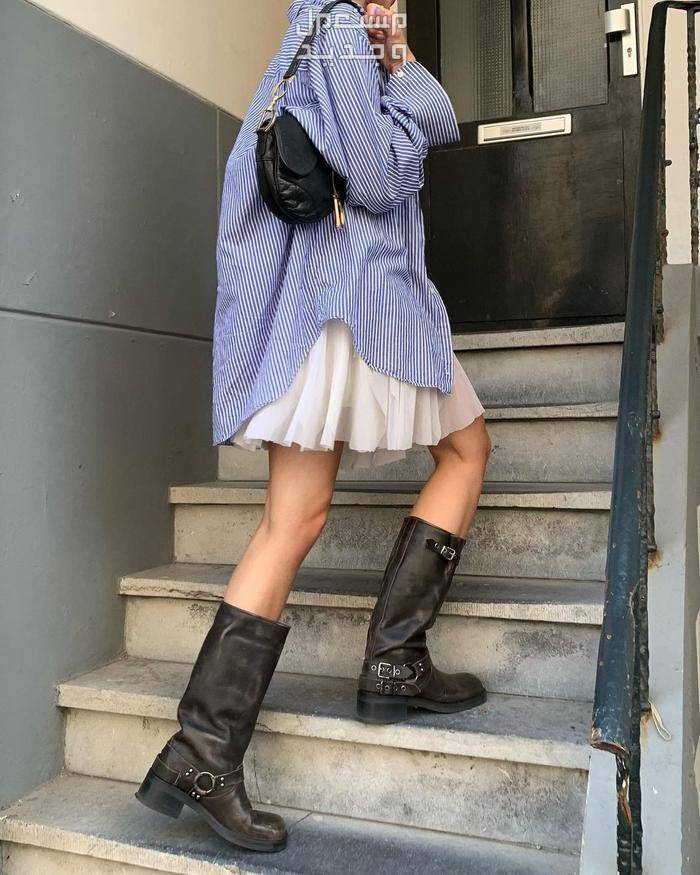 أحدث موديلات موضة أحذية بوت في شتاء 2024(صور) شكل حذاء H&M knee high biker boots  أثناء التنسيق