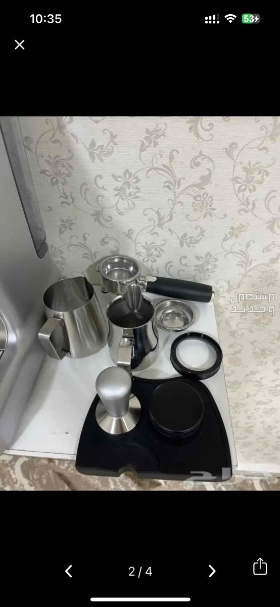 مكينة قهوه مع مطحنه وأدواتها