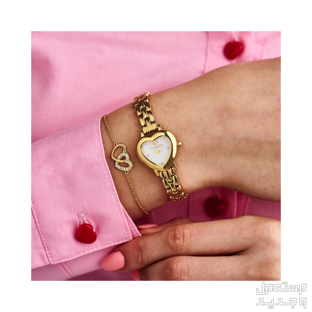 أنواع ساعات يد ذهب نسائية واسعارها شكل ساعة Olivia Burton Meant To Bee Gold Heart-Shaped Case OB16MC73في اليد