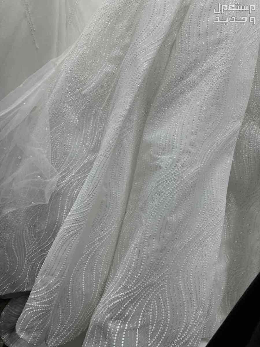 فاتورة فستان زفاف  وصباحيه من اختيارالعروس مع فستان طفله 5 سنوات في الأحساء بسعر 1700 ريال سعودي
