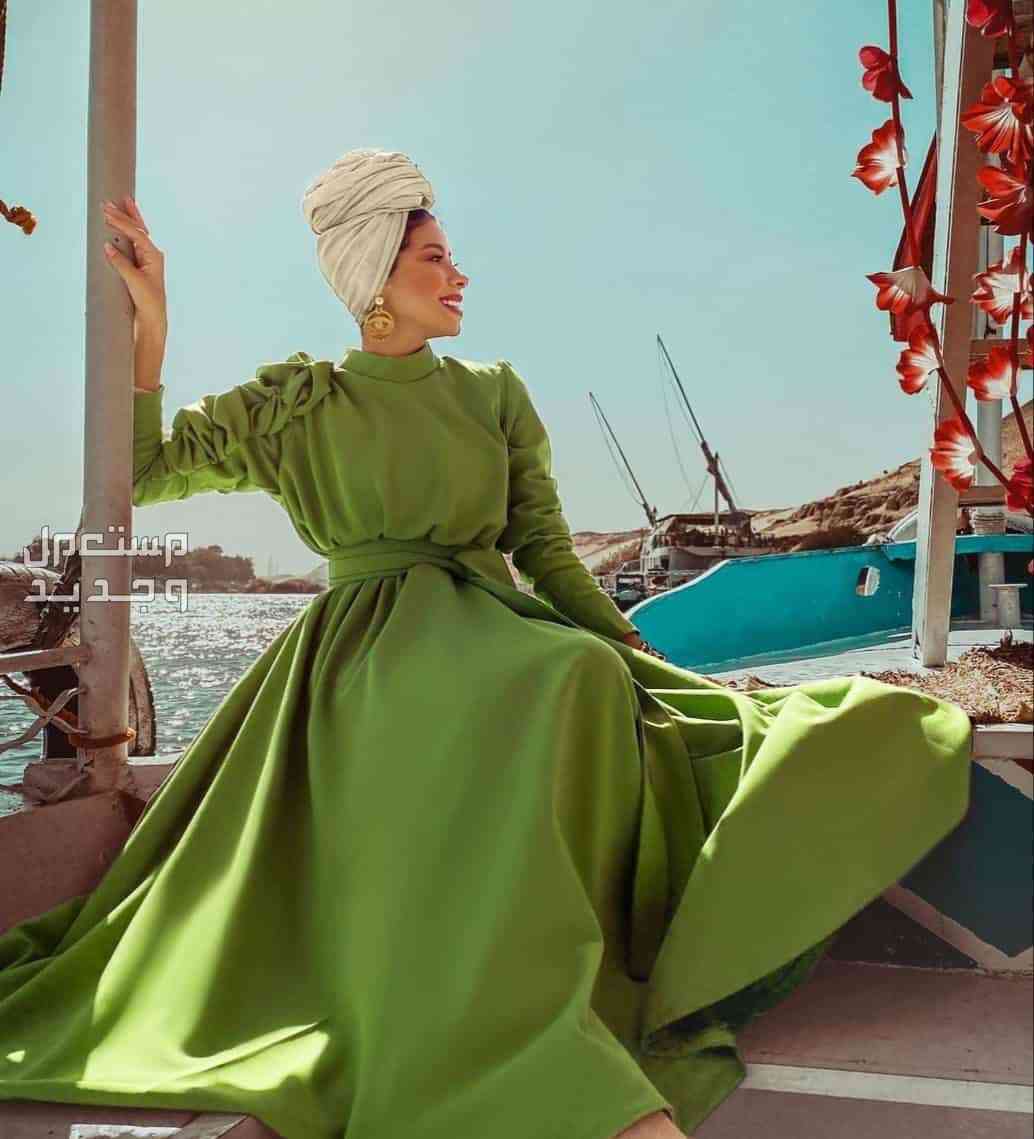 أشكال فساتين ربيعية للمحجبات 2024 في البحرين فستان أخضر