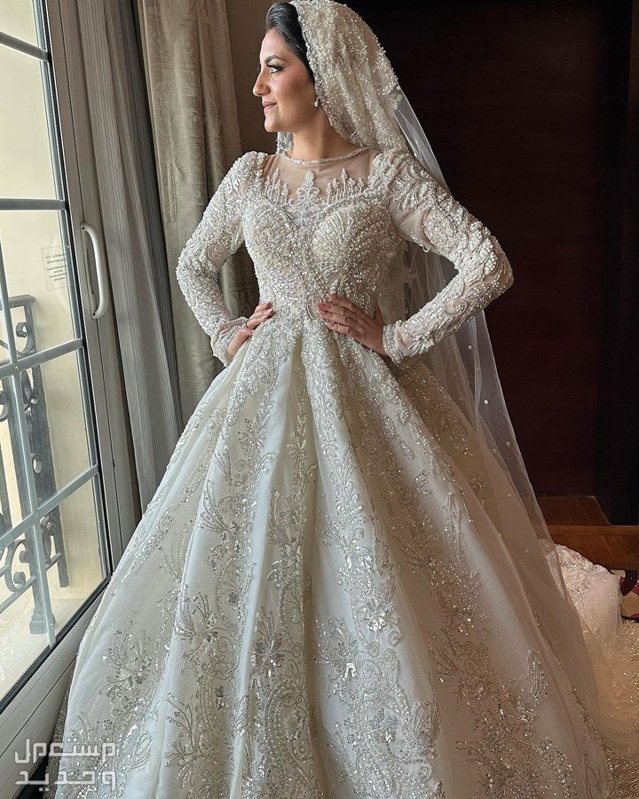 فساتين زفاف ملكية للمحجبات 2024 والأسعار كاملة في البحرين فستان زفاف ملكي 2024
