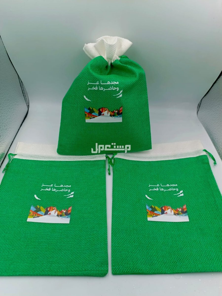 كابات اليوم الوطني أعلام السعودية توزيعات علم وشاحات اليوم الوطني أسعار جمله علم كبوت علم يد يوم التأسيس