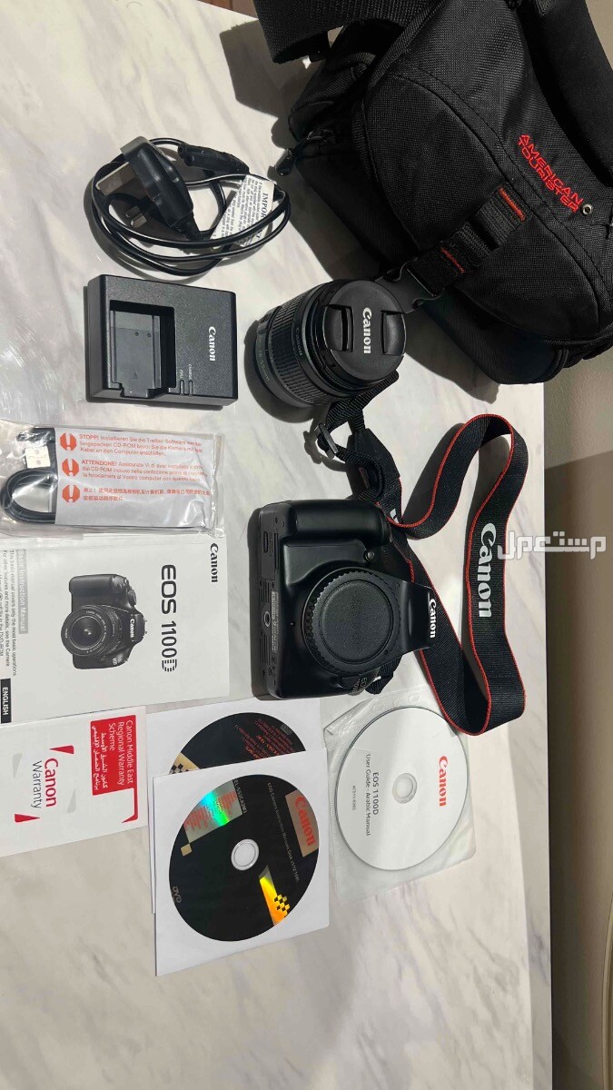 كاميرا كانون 1100D استخدامت قليل جدا جديده بكامل ملاحقتها