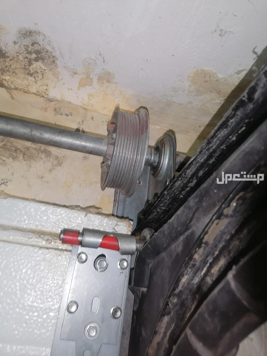 صيانة وإصلاح وتصليح باب أتوماتيك اوفر هيد أمريكي