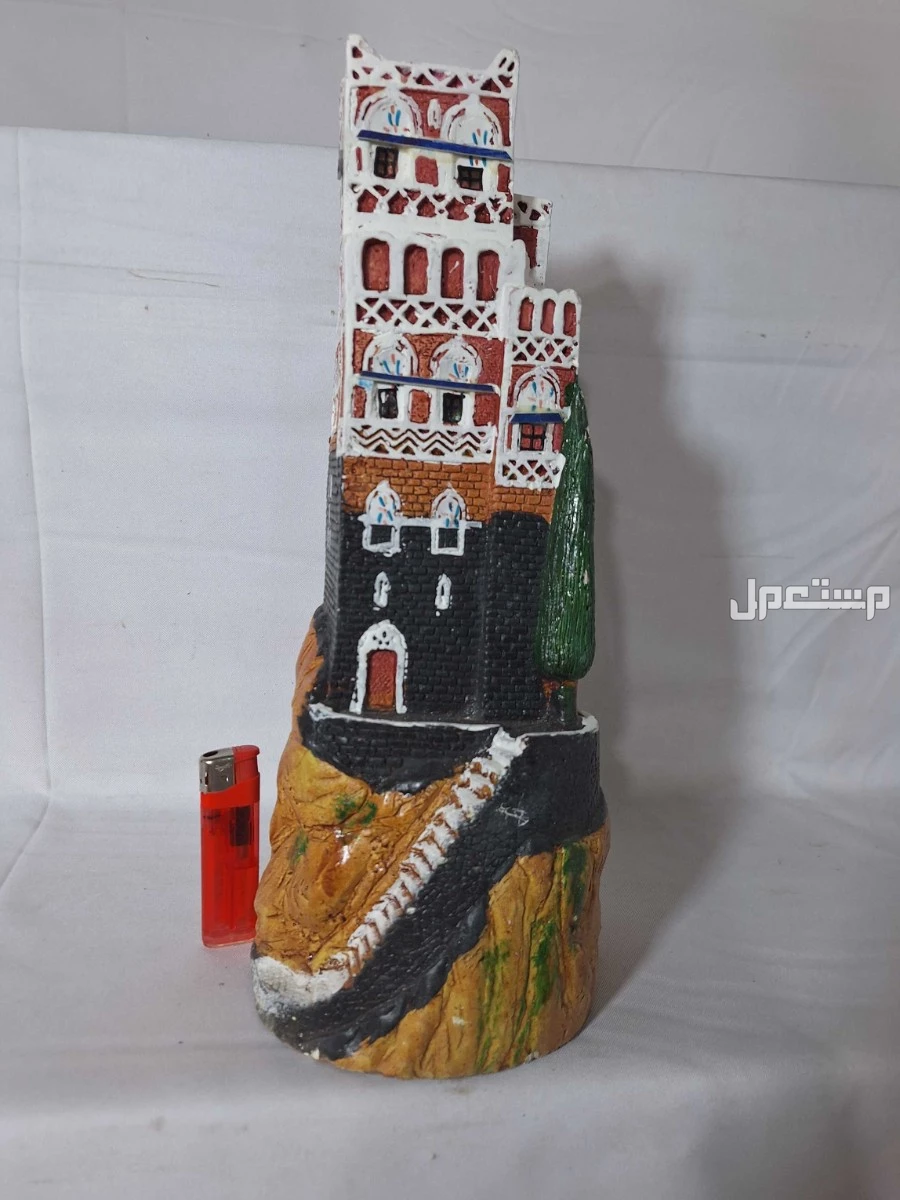 مجسمات تراثية جميلة لبيوت عسير القديمة