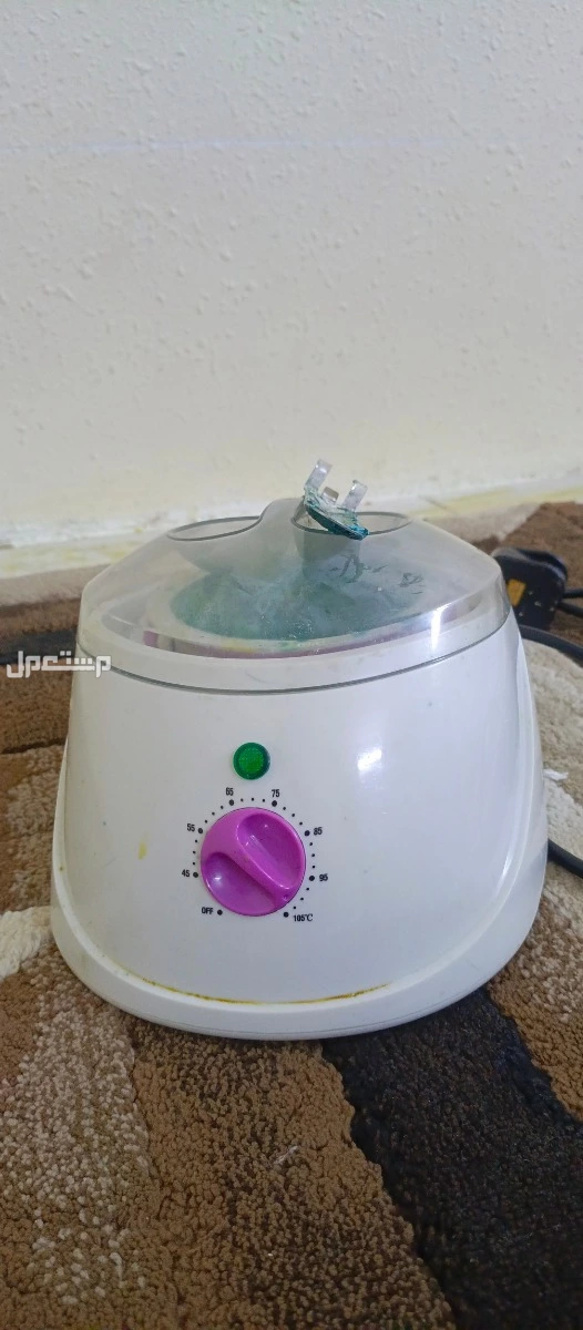عندي جهاز مذيب الشمع  بحالة جيده