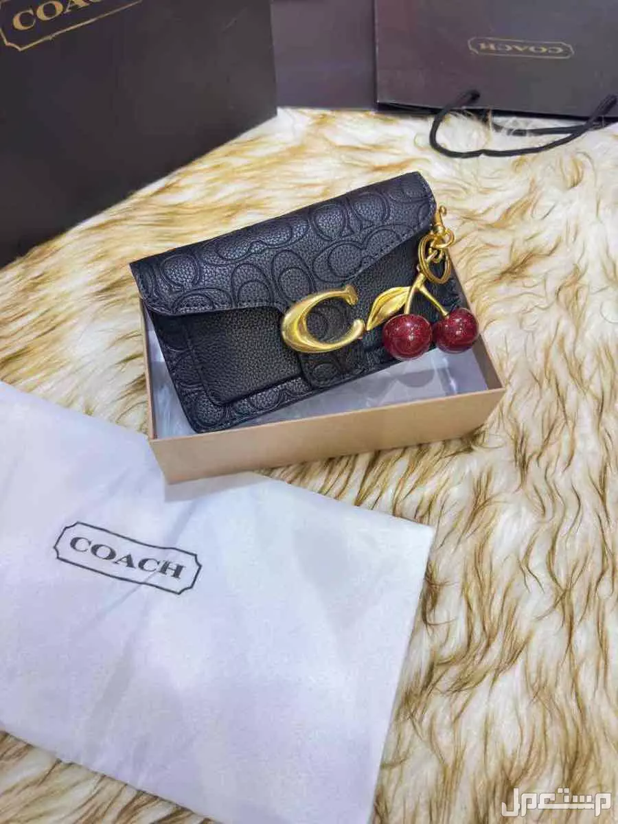 شنط ماركة كوتش درجة اولي حجمين مع البكس