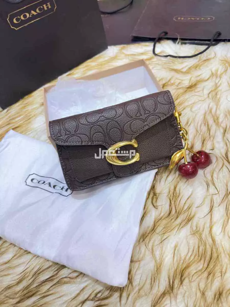 شنط ماركة كوتش درجة اولي حجمين مع البكس