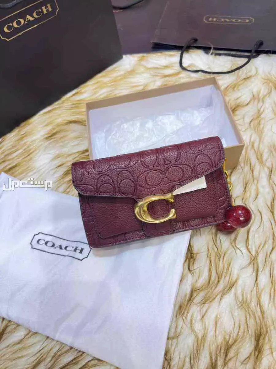 شنط ماركة كوتش درجة اولي حجمين مع البكس
