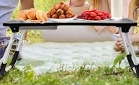 طاولة لابتوب أرضية قابلة للطي والحمل متعددة الاستخدامات للمنزل أو النزهات (جديدة)