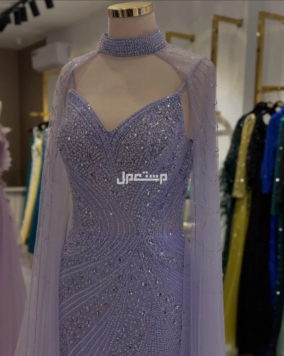 معرض ماك سنتر للفساتين النسائية