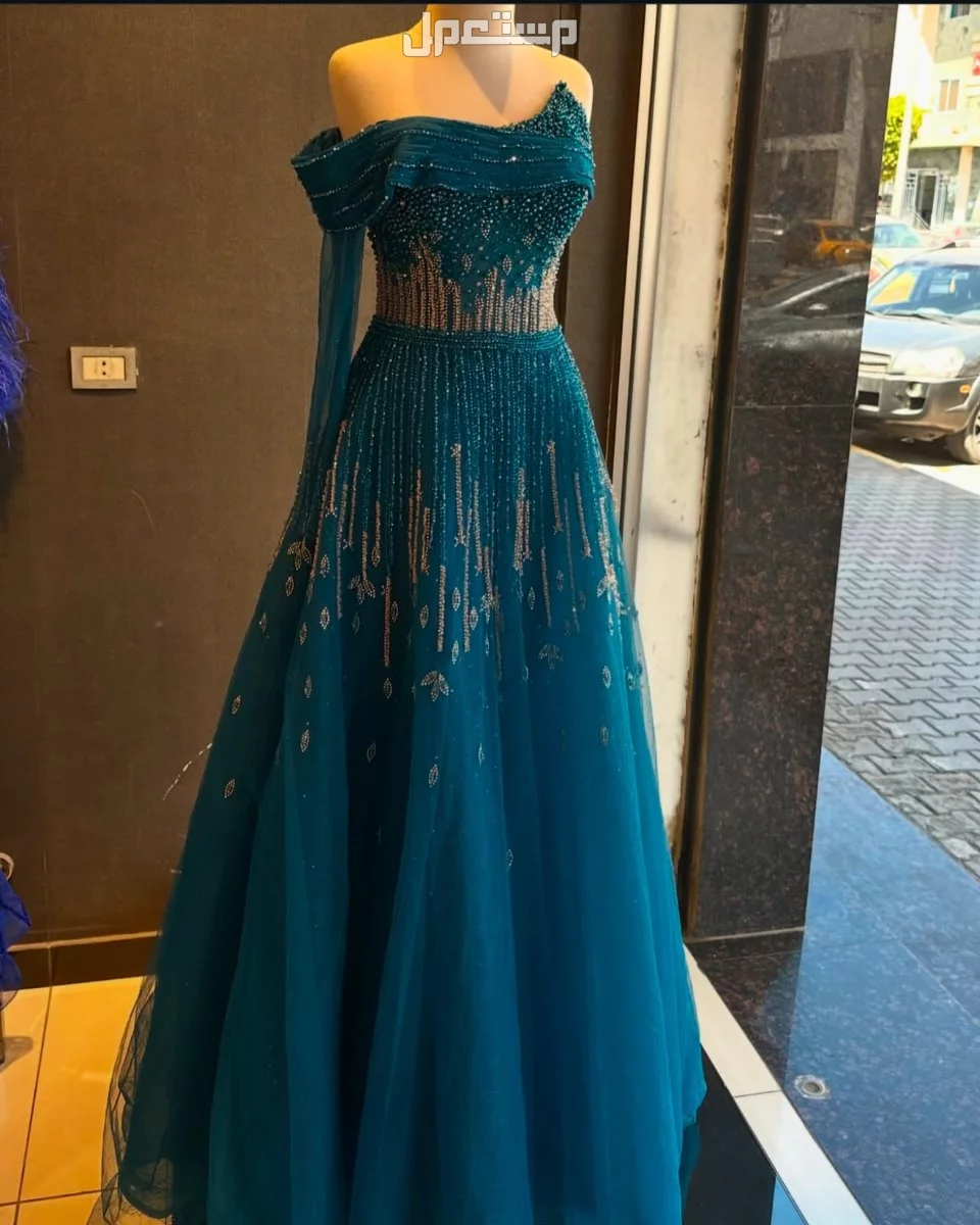 معرض ماك سنتر للفساتين النسائية