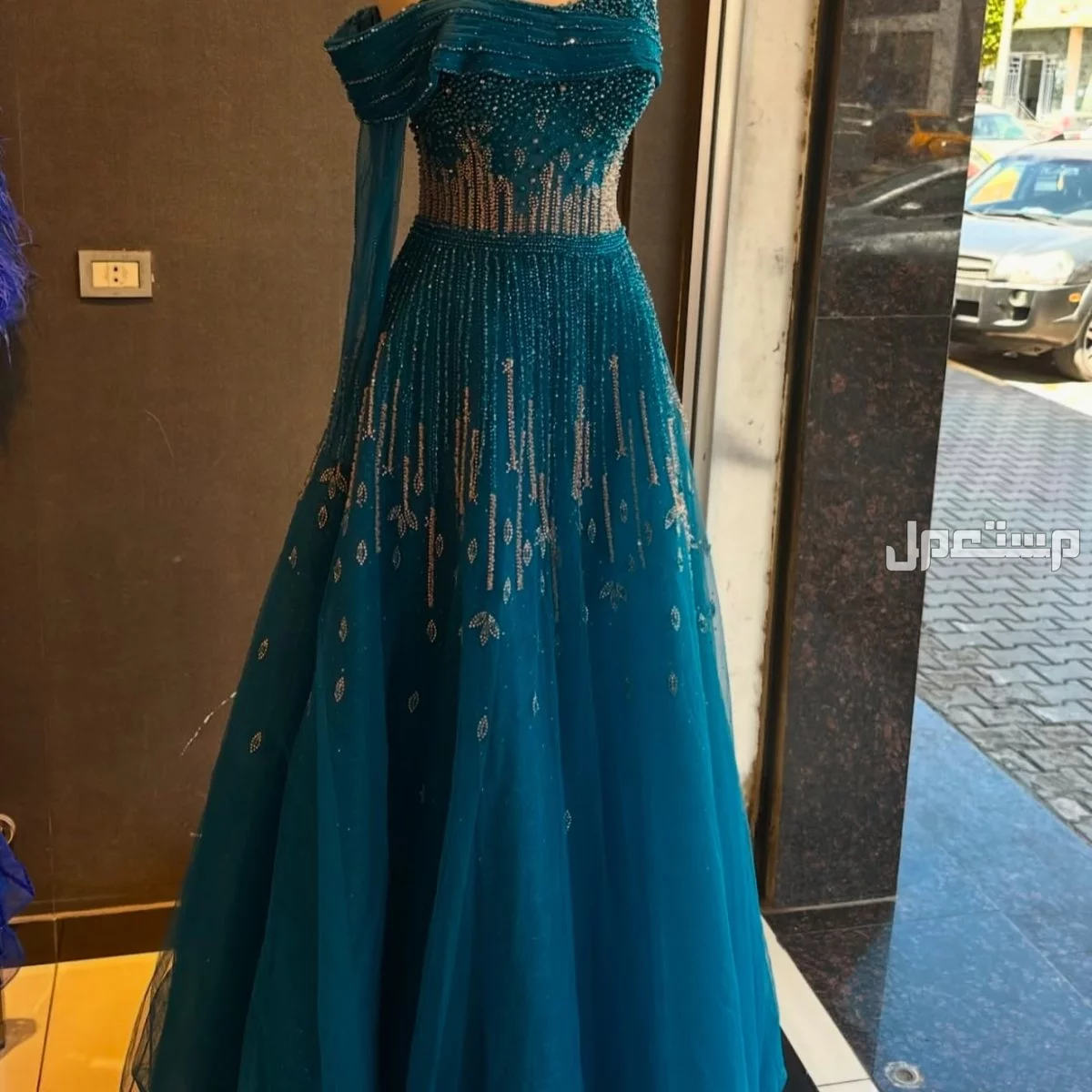 معرض ماك سنتر للفساتين النسائية