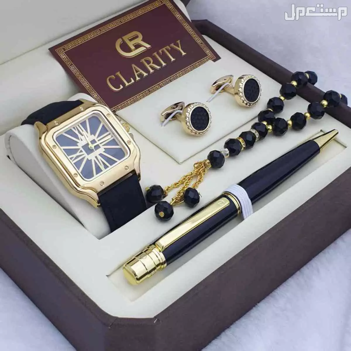 *جديدنا بكس رجالي ‏مناسب جدا الإهداء العيد* مكون من ساعة رجالي جلد شموة ماركة كليرتي  ضمان سنة ماء مكينة بطارية اي خلل فني قلم كلاسيك رجالي كبك كلاسيك رجالي سبحة مميزة  بكس. نفس الصوره