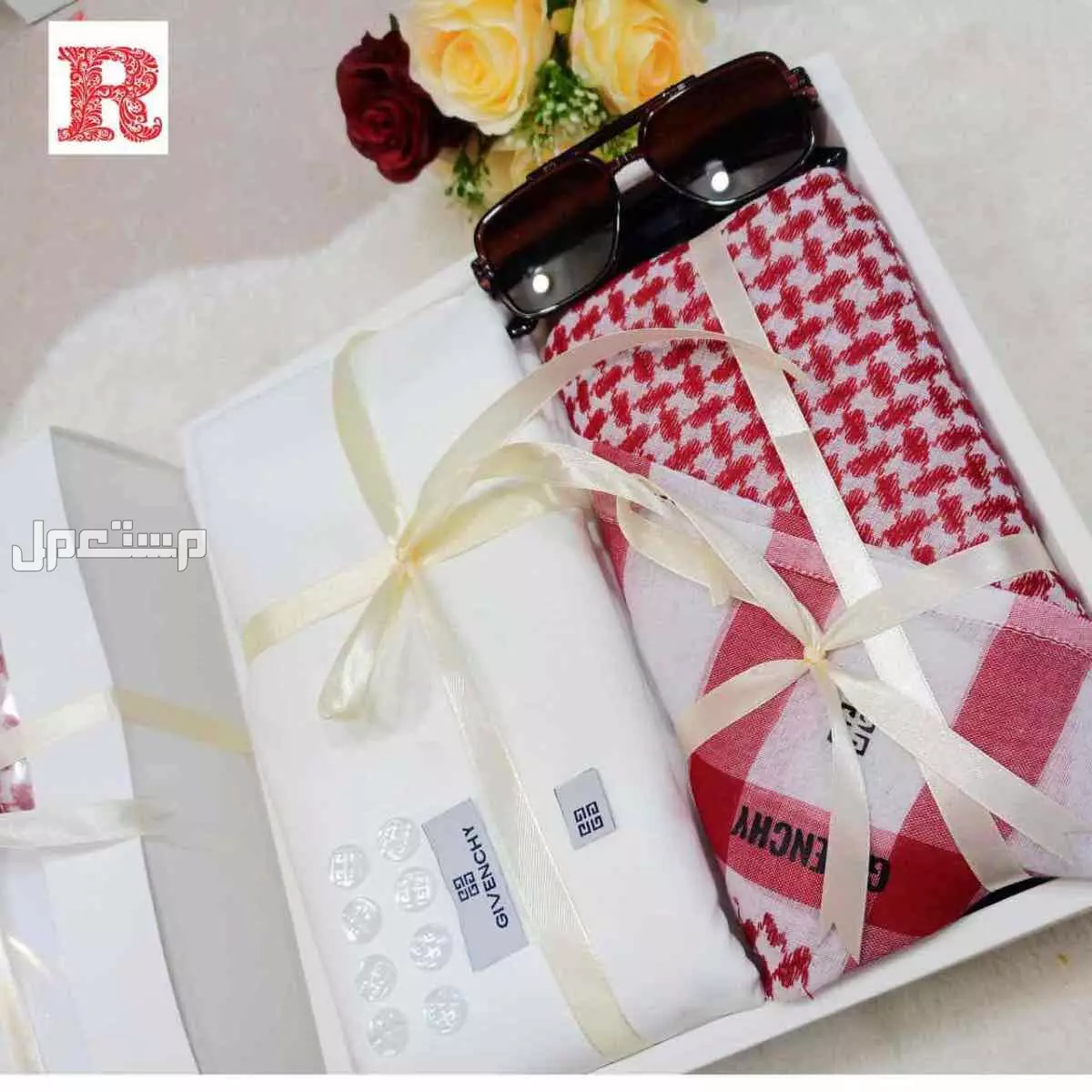 بوكس رجالي كارتير. **شماغ رجالي أحمر او أبيض **:      -درجة اولى  يضمن جودة عالية ومظهرًا أنيقًا. مقاسات55/58/60 2.  *قماش رجالي ماركة جيفينشي درجة* اولى+ملحقات8ازرار مع لوقو للجيب و الرقبه