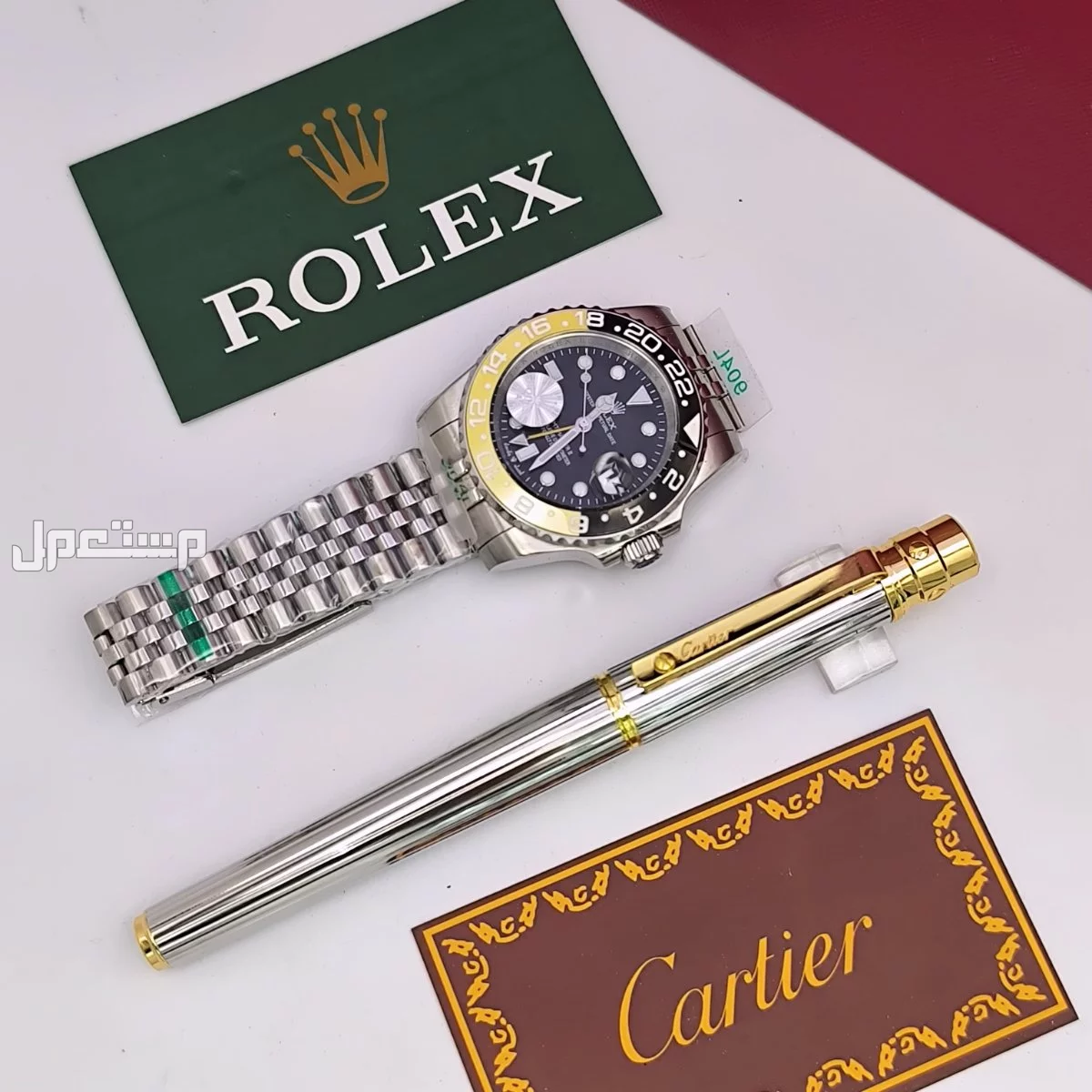 ساعات ____رجالي..   رولكس.. درجه اولى.  مع قلم كارتير درجة اولى مع جميع ملحقات الماركه.. *السعر 300 ريال*..