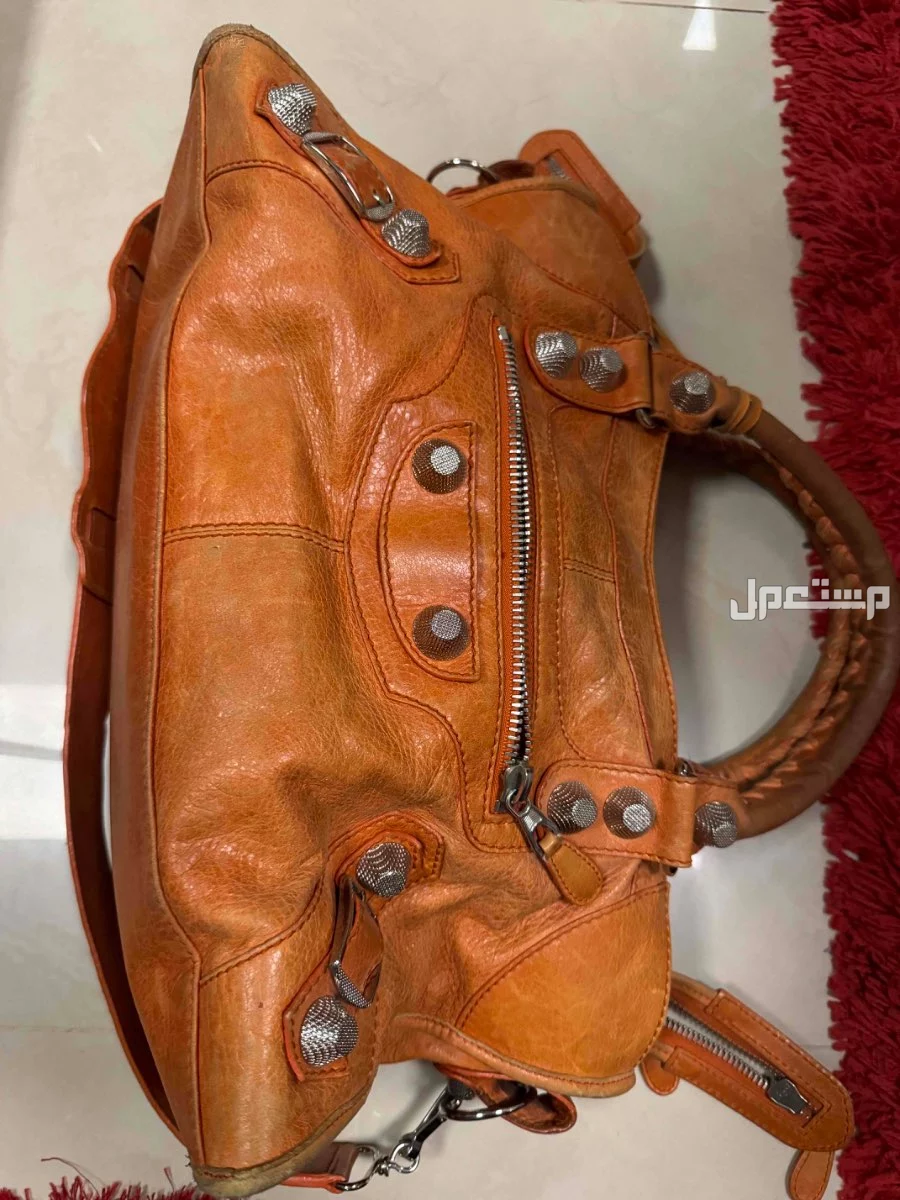 شنطة بلانسياغا برتقاليه مستعمله