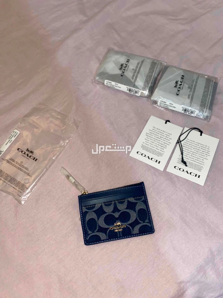 محفظة كوتش رجالي نسائي اصلي كلكشن جديد ونادر 399 ريال