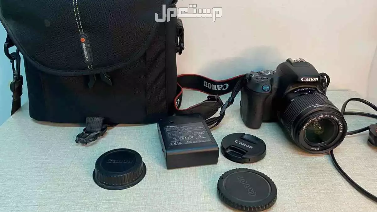 كاميرا كانون 200d بكامل ملتزماتها مع شنطتها وشاحنها