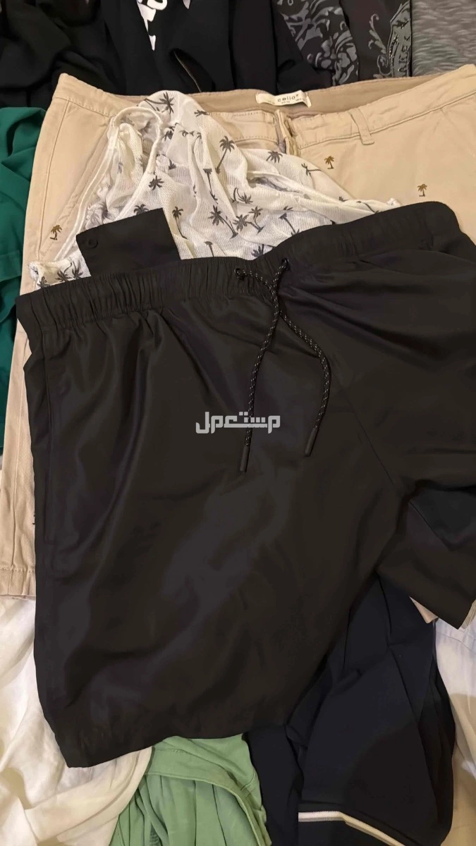 ملابس ماركات عالمية أصلية جديدة بأقل من ربع السعر مقاس 38 XL