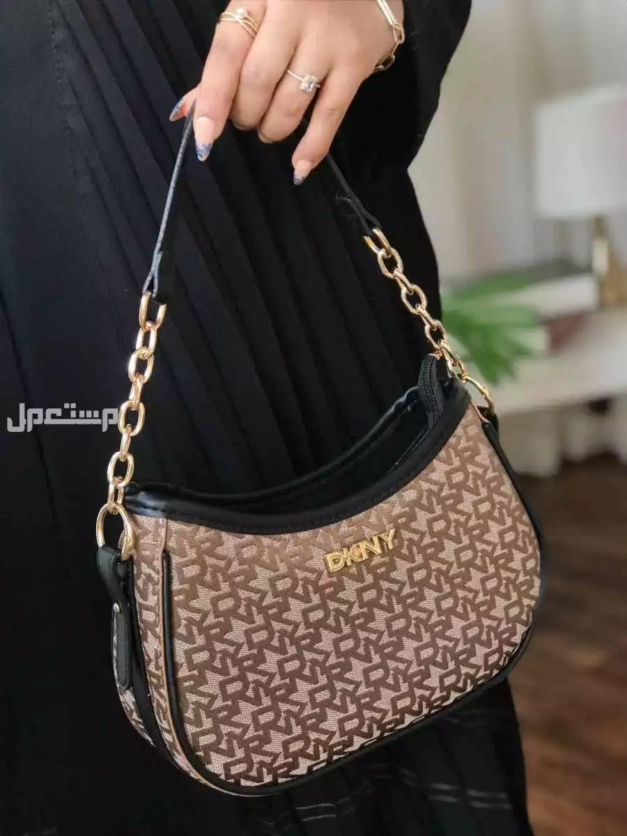 شنط ماركة دكني درجة اولي حجمين