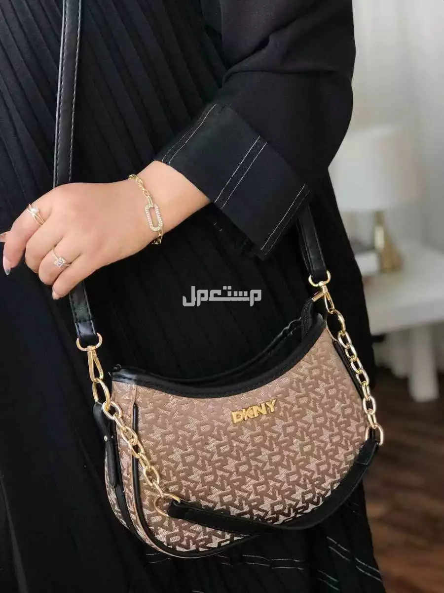 شنط ماركة دكني درجة اولي حجمين