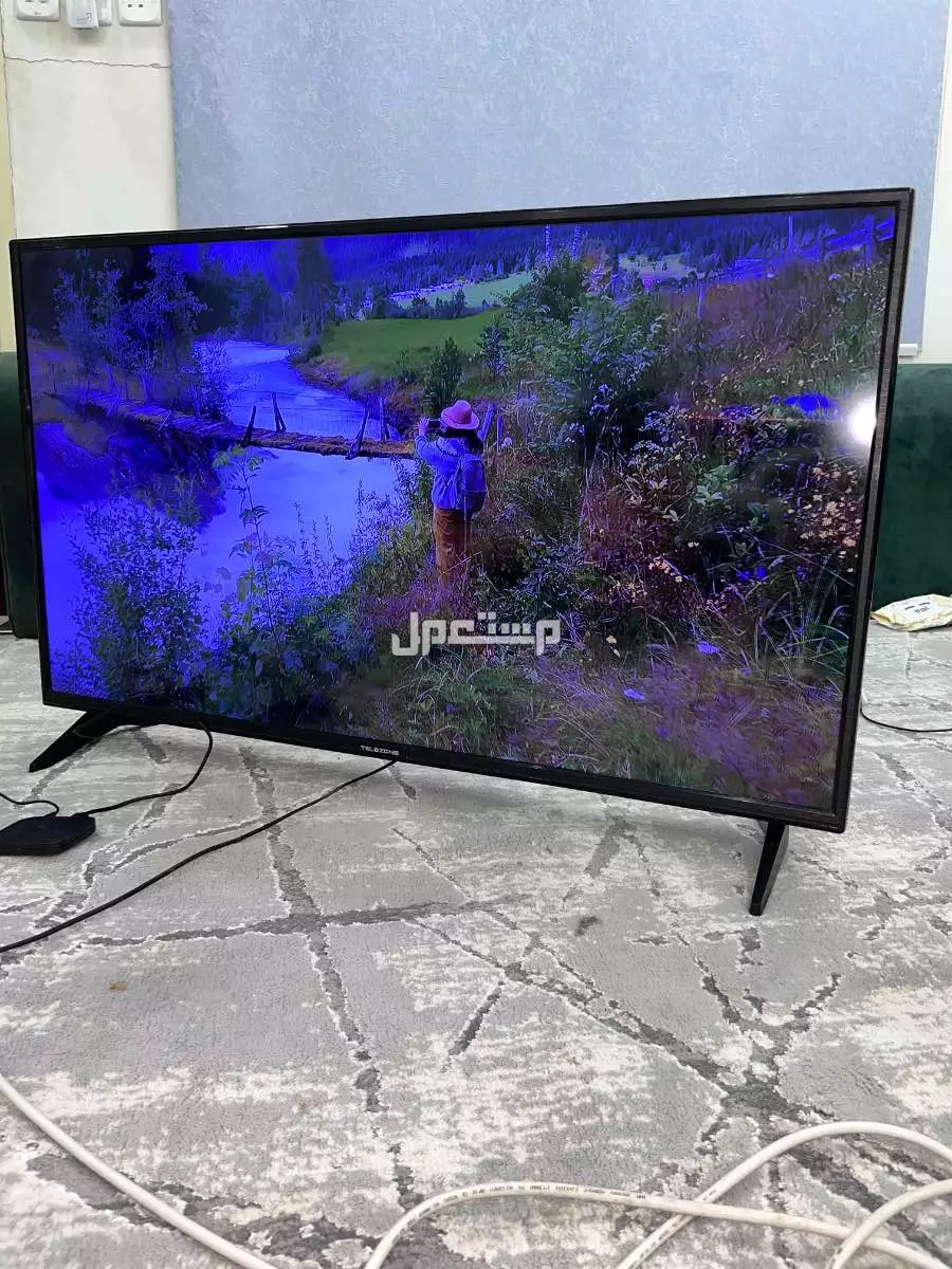 شاشة TELEZONE شبة جديدة 60 بوصة للبيع