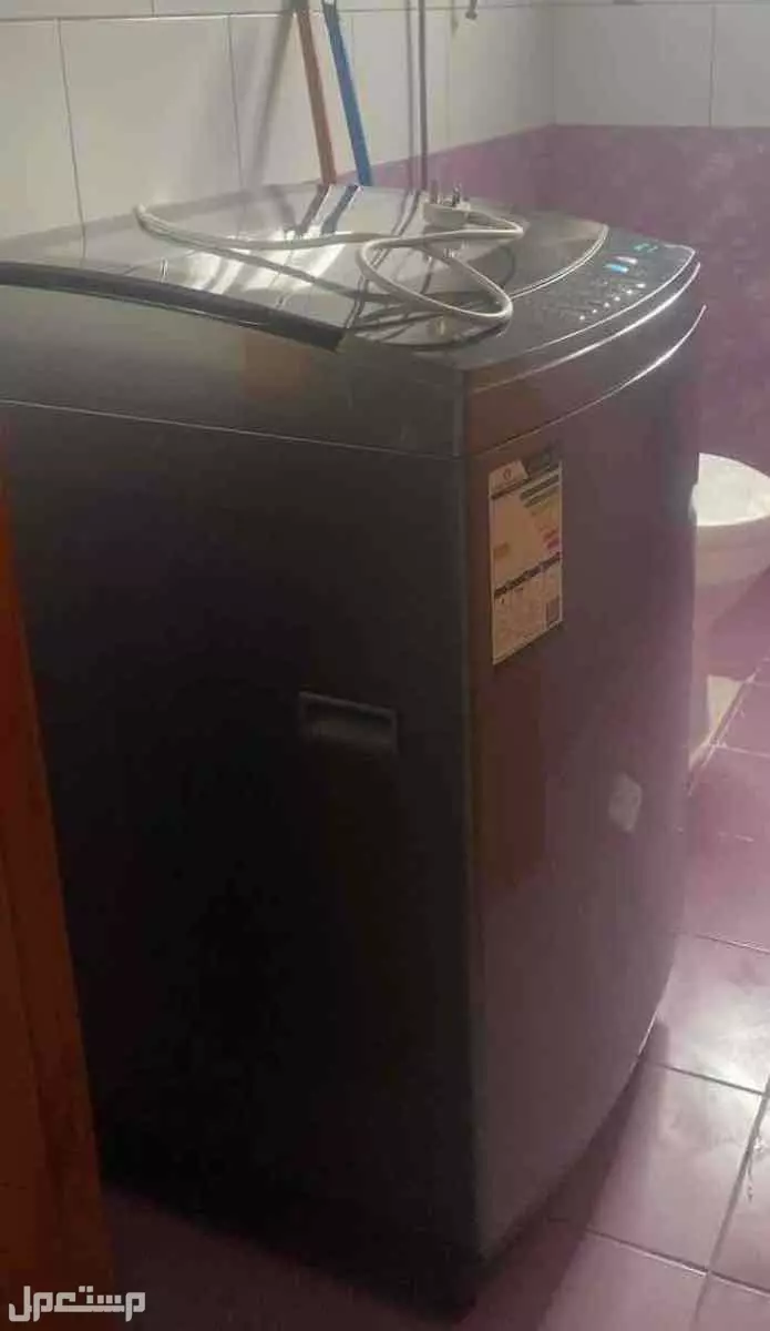 غسالة اتوماتك حوض 12 كيلو في الباحه