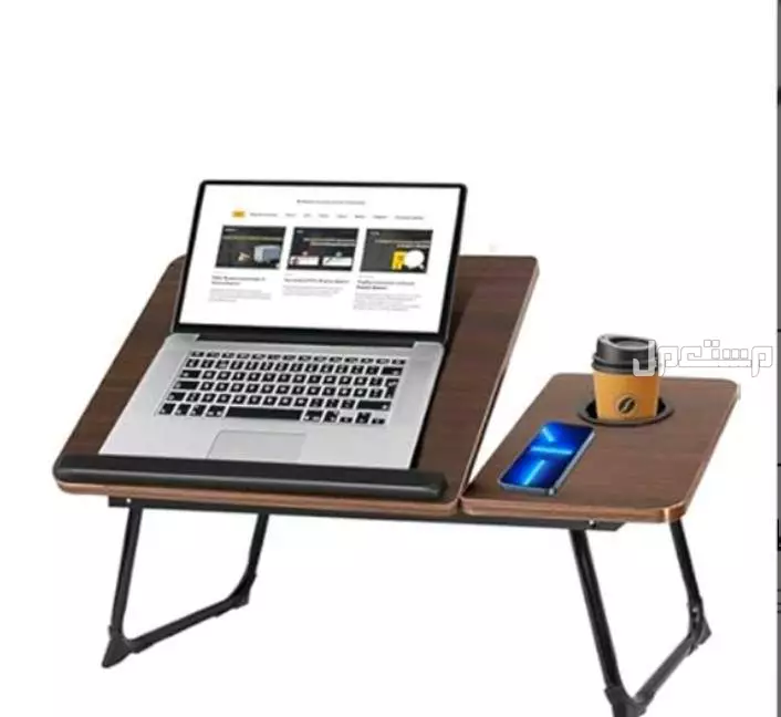 طاولة سرير قابلة للطي تنفع مع اللابتوب و الدراسة و القراءة وطاولة عشاء علي السرير وبها مكان لوضع المشروب متوفره للطلب لكل المدن والتوصيل والشحن مجانا