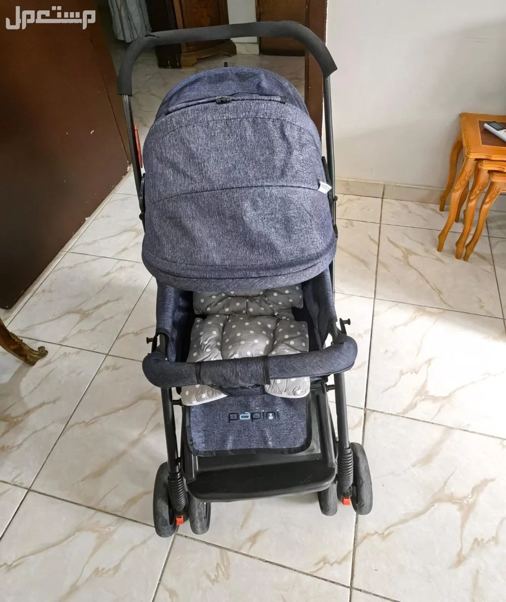 سرير اطفال شبه جديد نظيف جدا وكرسي طعام استخدم ابدا ودراجه وعربيه  للبيع بدواعي السفر