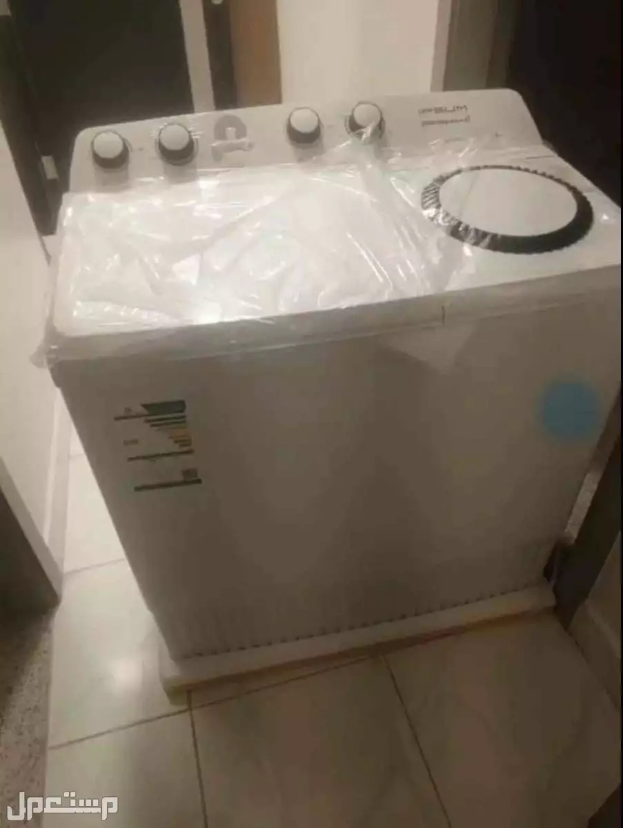 غساله جديده بكرتونها معها ضمان سنتين