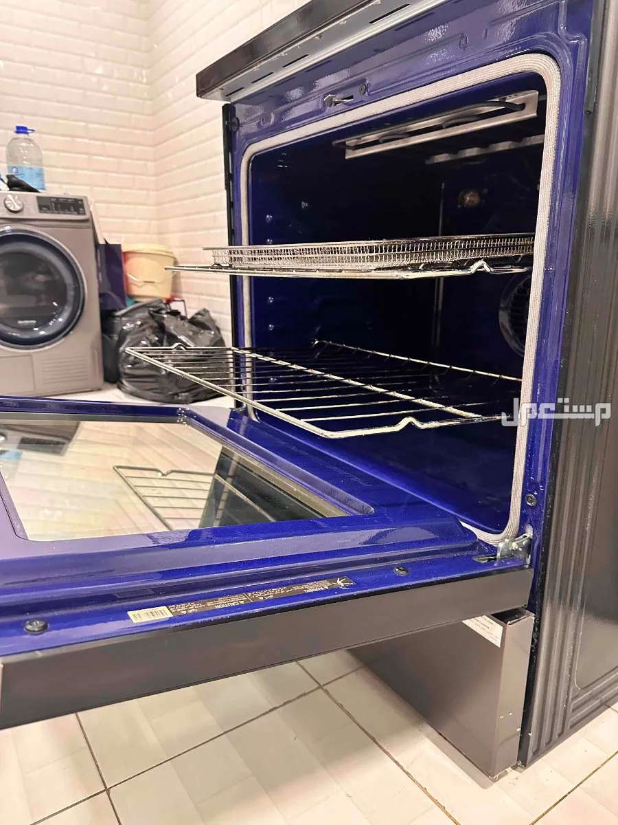 فرن LG كهرباء شبه جديد بقلاية هوائية و 5 عيون في الدمام
