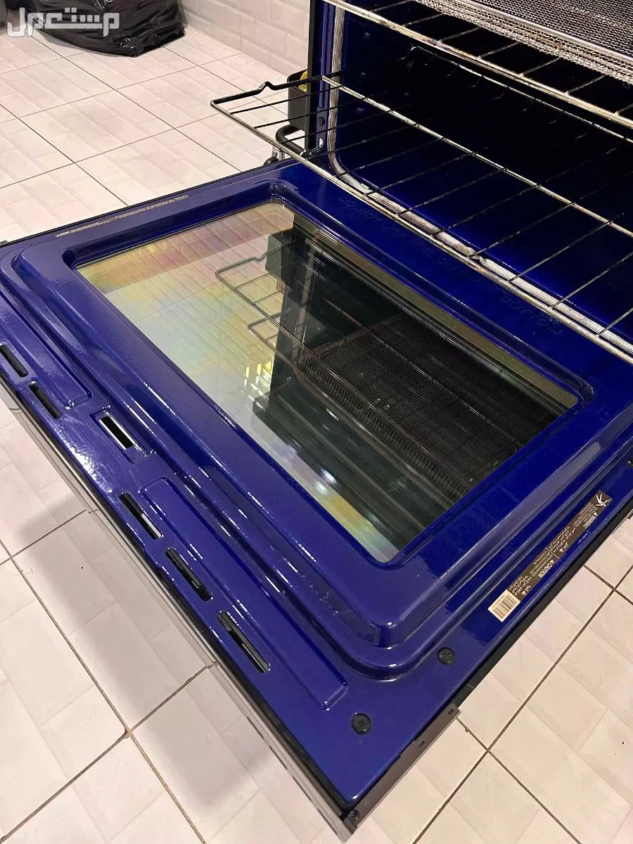 فرن LG كهرباء شبه جديد بقلاية هوائية و 5 عيون في الدمام