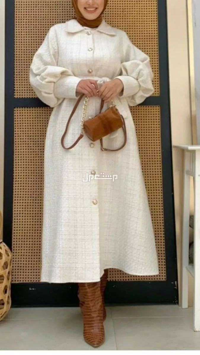 أجمل فساتين الشتاء 2026 التي يجب اقتناؤها.. اكتشفي موضة الموسم بالصور فساتين شتوية للمحجبات